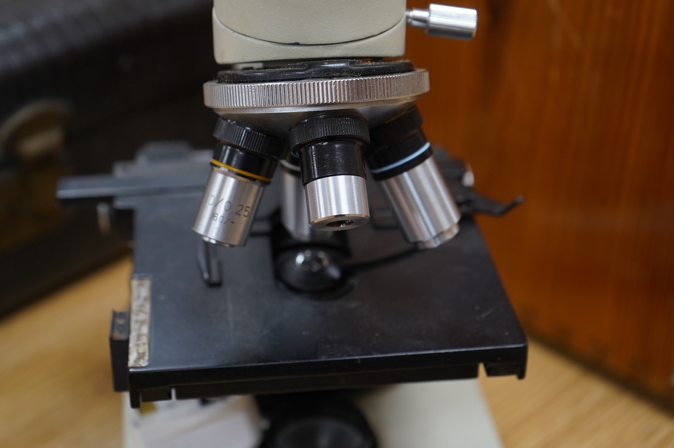 A pine cased mid 20th century monocular microscope XSP-18S supplied by Brunel Microscopes Ltd, case; 45 x 24.5 x 27cm. Condition - good.